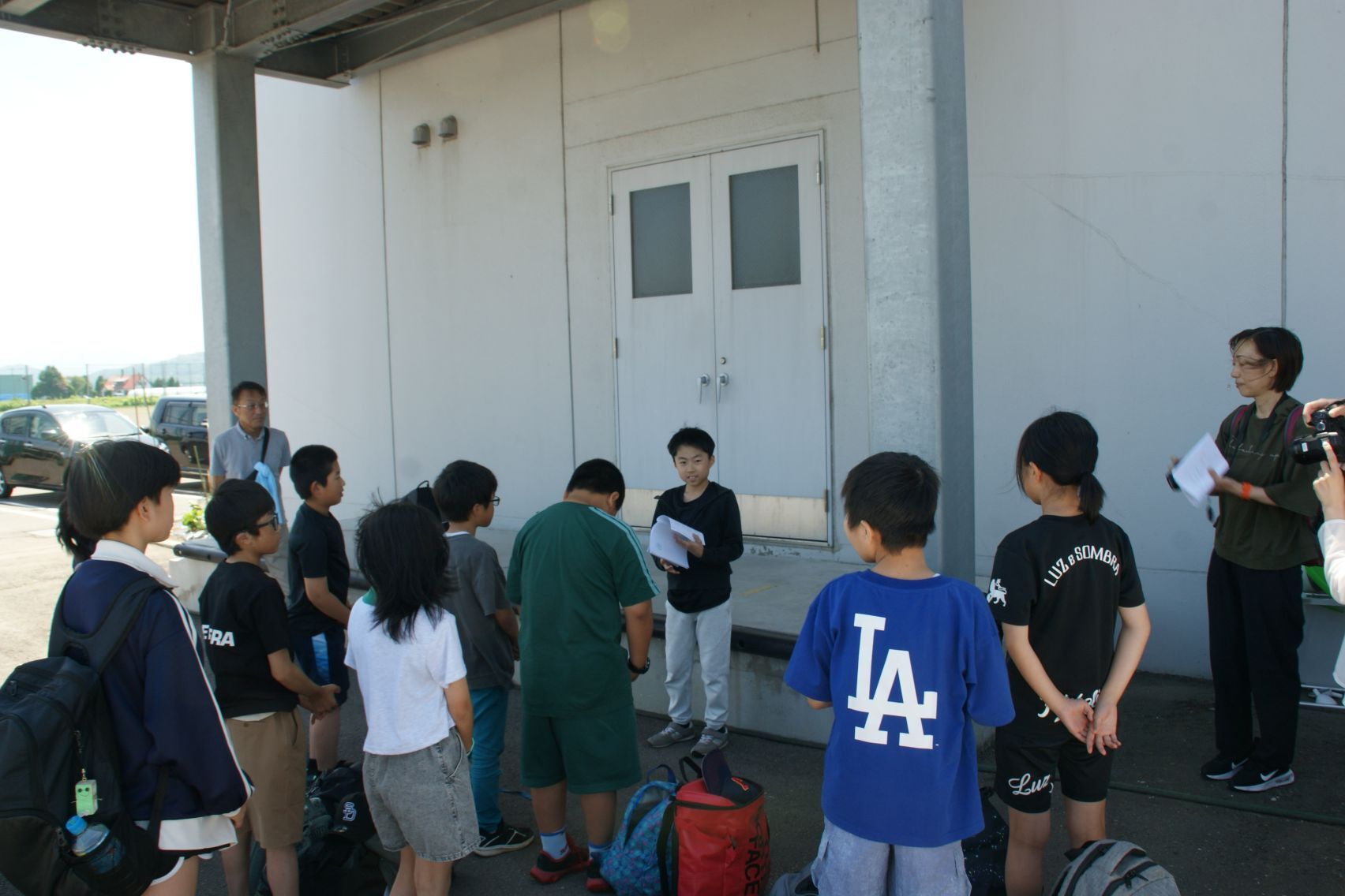 5年生宿泊学習到着式の様子.JPG